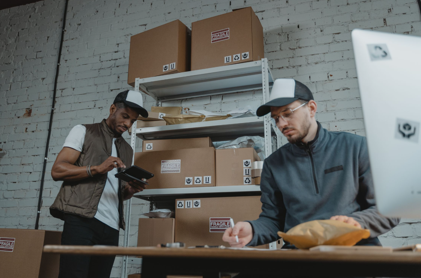 Warehouse team packing and preparing shipments for delivery