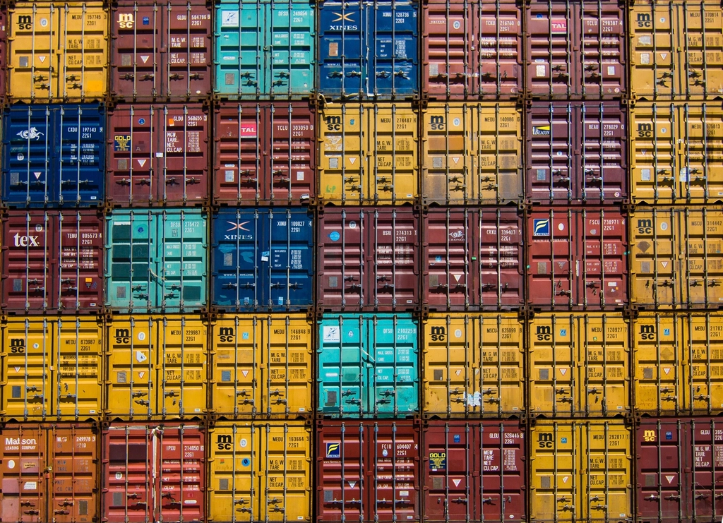 Stacked shipping containers in many colours