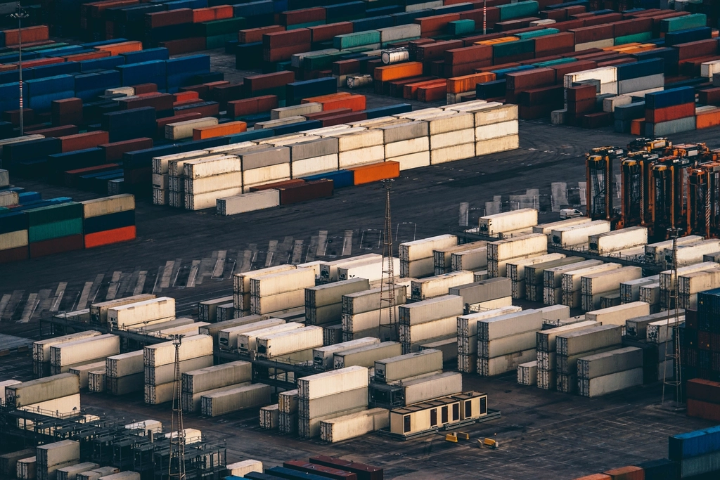 Aerial view of a container port at dusk