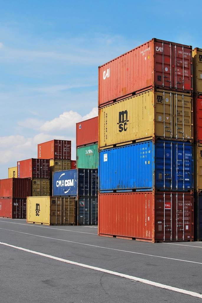 Shipping containers stacked in a storage yard