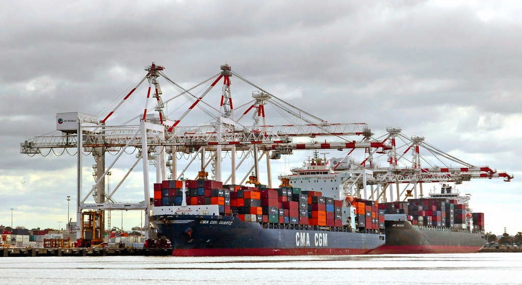 Container ship being worked at a port terminal